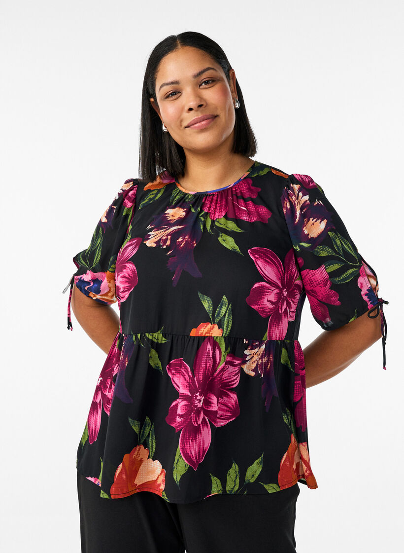 Bluse mit gebl&uuml;mtem Print und Peplum, Schwarz, Model image number 0