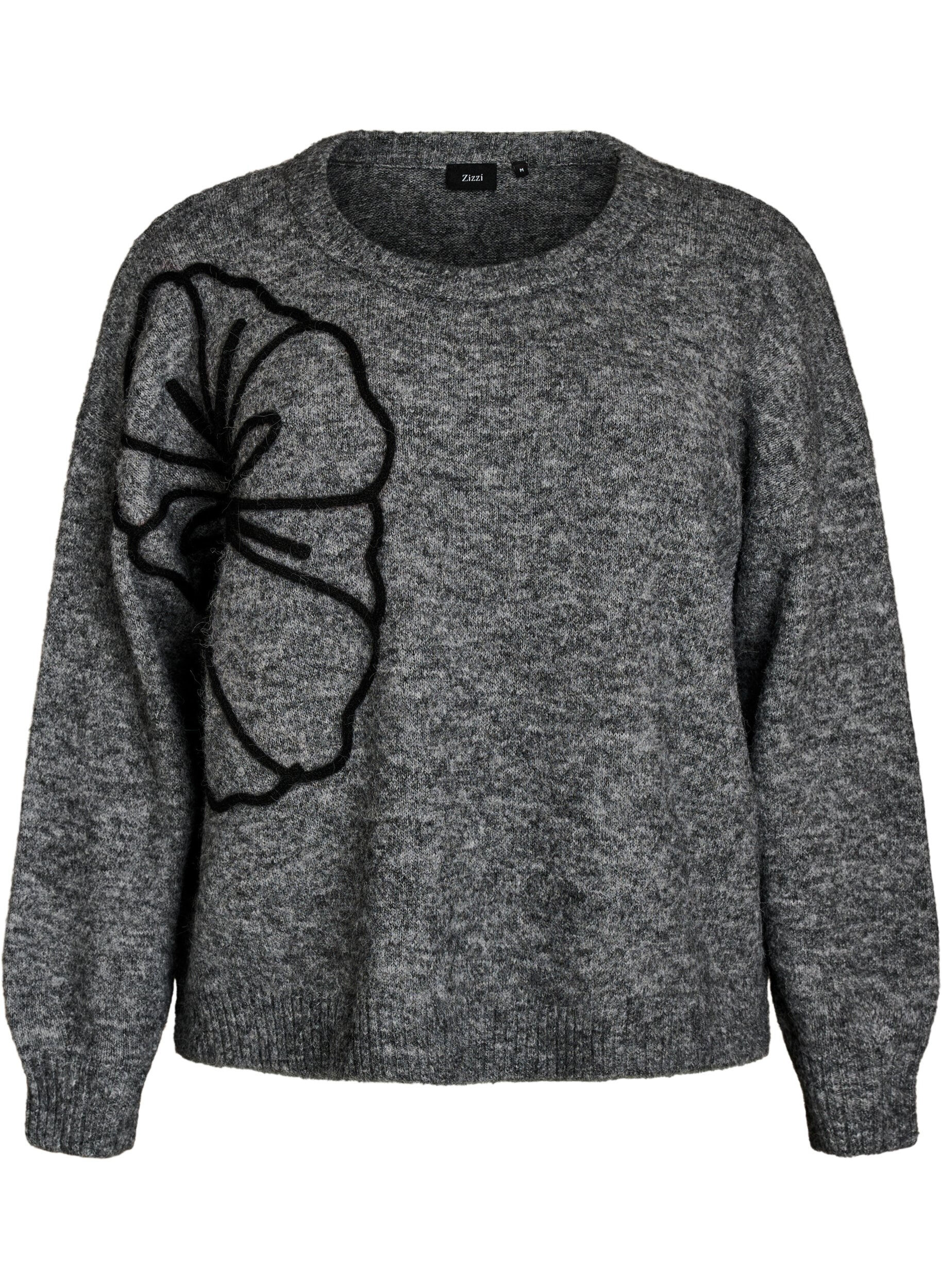 Pull avec application florale
