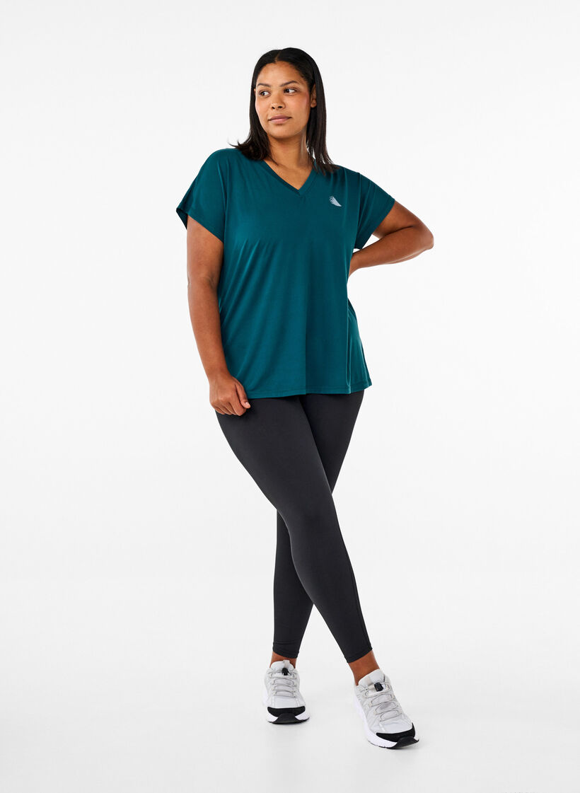 T-shirt de sport ample avec col en V, Vert fonc&eacute;, Model image number 1