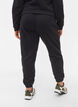 Pantalon ample en coton avec poches, Noir, Model image number 1