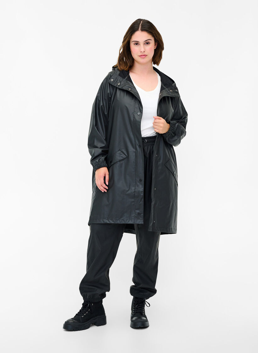 Regenjacke mit Kapuze und Knopfverschluss, Black, Model image number 2