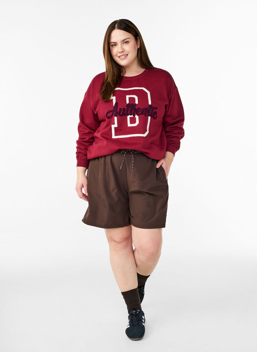 Sweatshirt mit Frottee-Schriftzug, Dunkles Bordeaux, Model