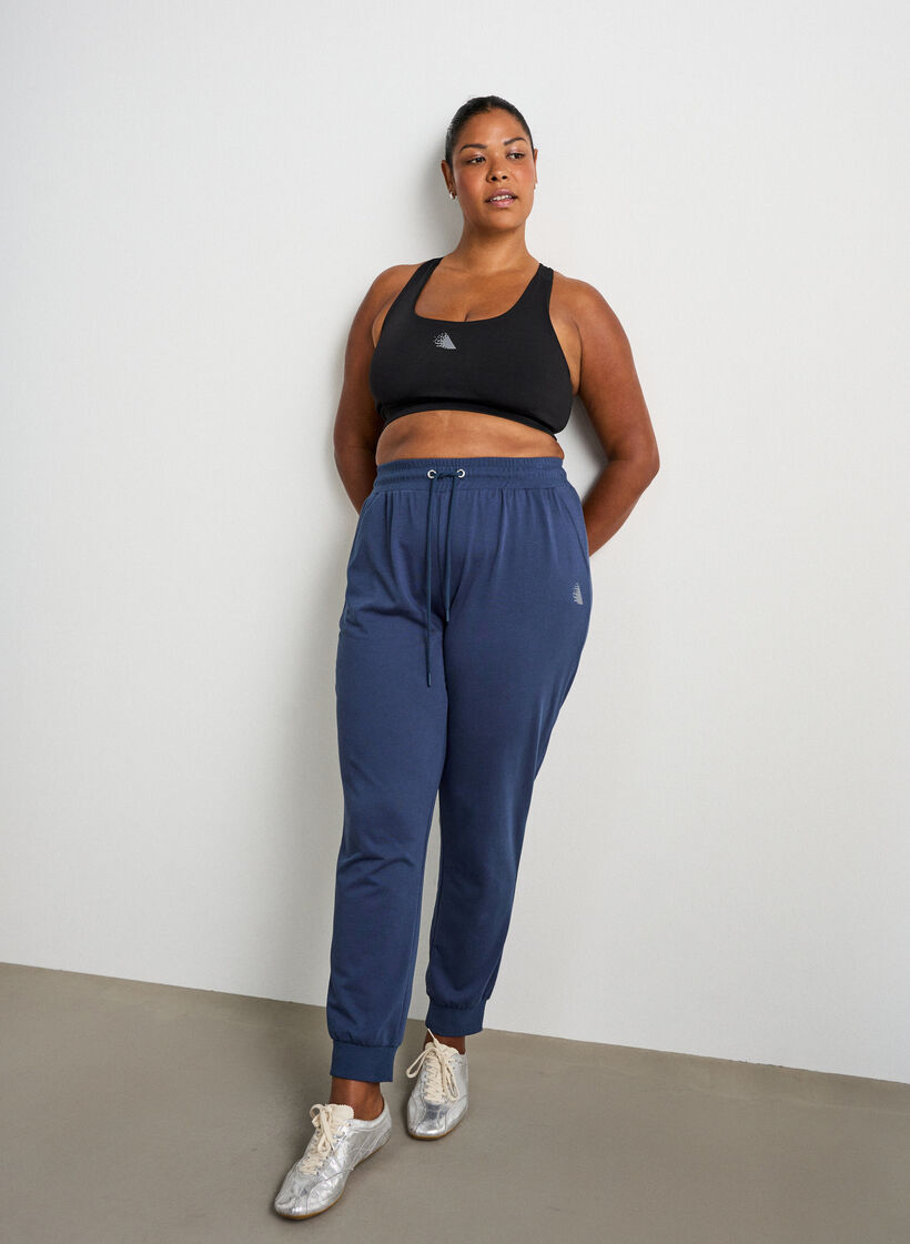 Pantalon de surv&ecirc;tement ample avec poches, Bleu, Model image number 0