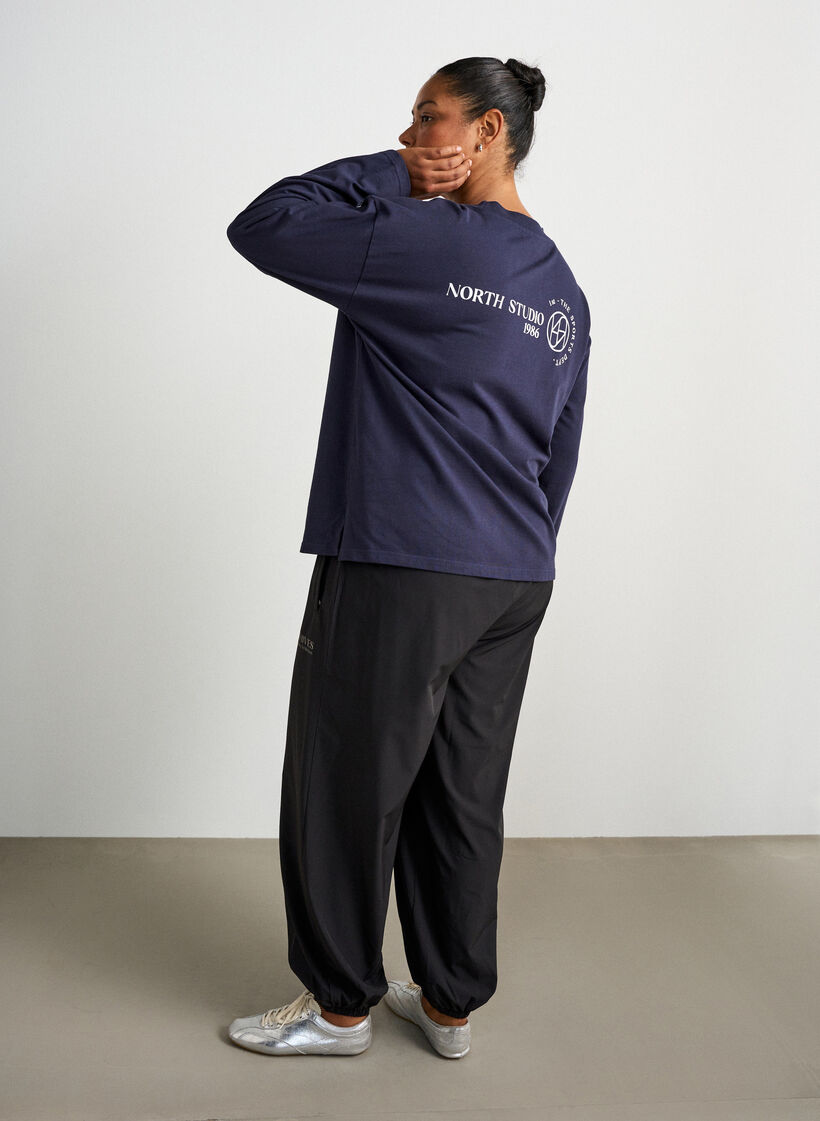Pantalon d'entra&icirc;nement avec jambes ballon, Noir, Model image number 1