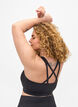 Soutien-gorge de sport avec bretelles croisées dans le dos, Black, Model image number 1