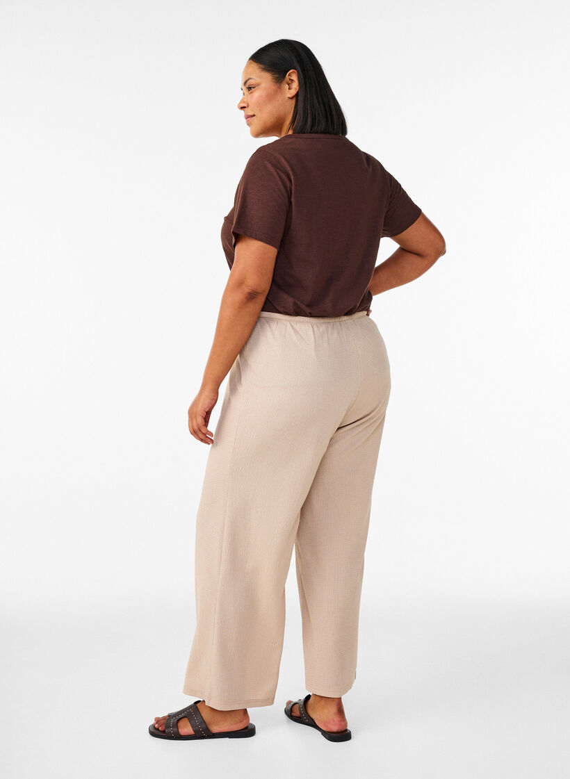 Pantalon large en tissu l&eacute;ger et textur&eacute;, Beige, Model image number 1