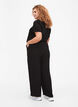 Pantalon ample en viscose avec poches, Noir, Model image number 1