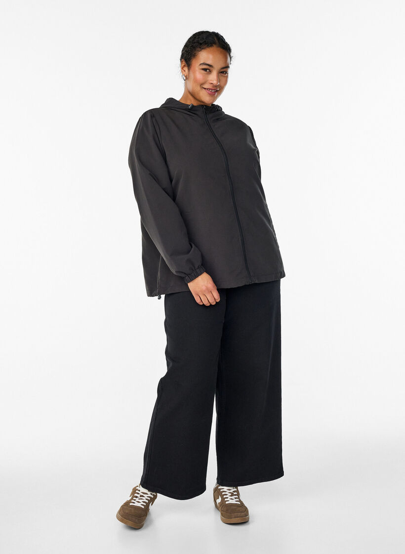 Veste l&eacute;g&egrave;re avec capuche et fermeture &eacute;clair, Noir, Model image number 1