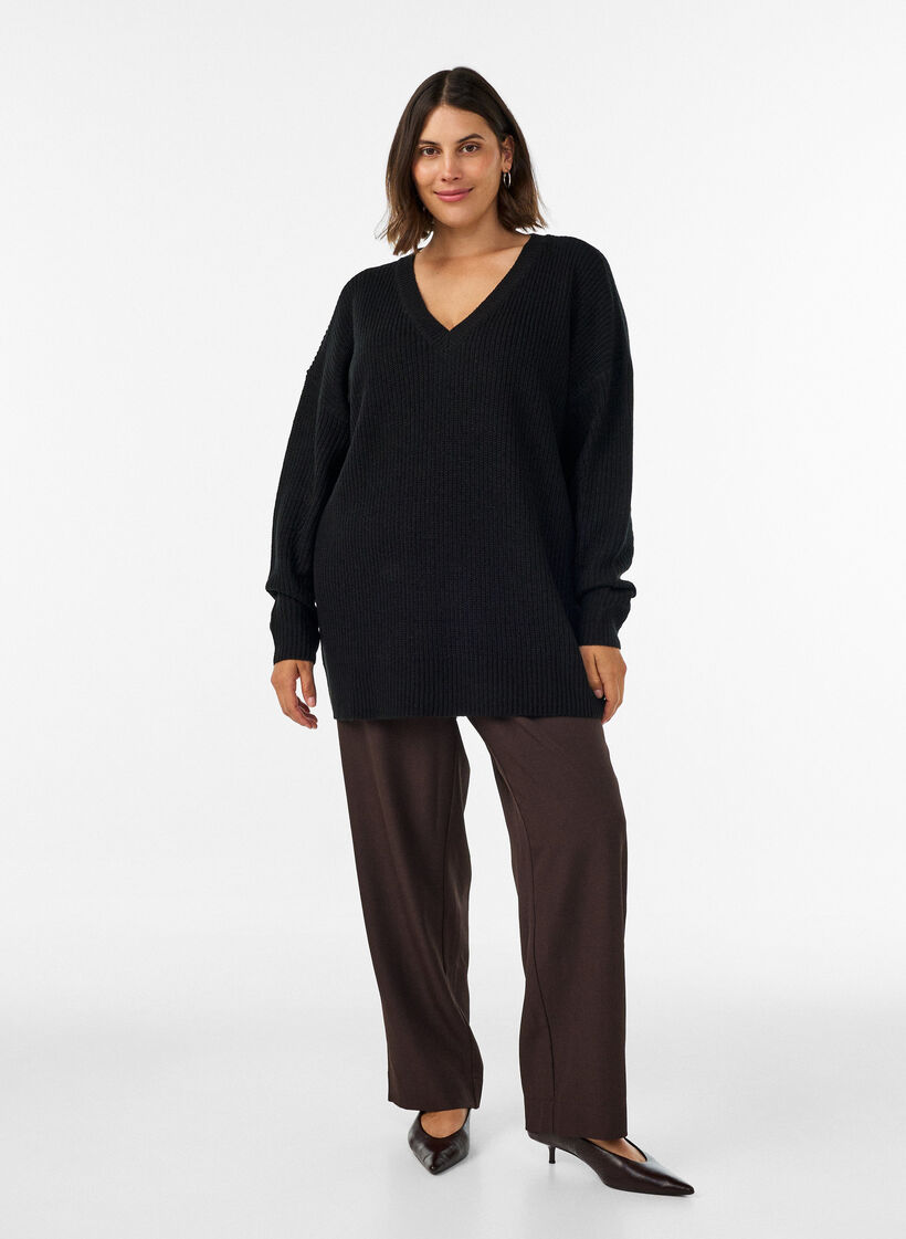 Lange Rippstrickbluse mit V-Ausschnitt, Schwarz, Model image number 1